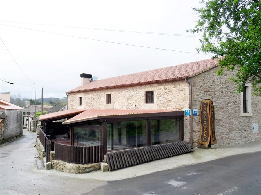 Casa O Gurés, construcción de piedra de 1917 en Muxía
